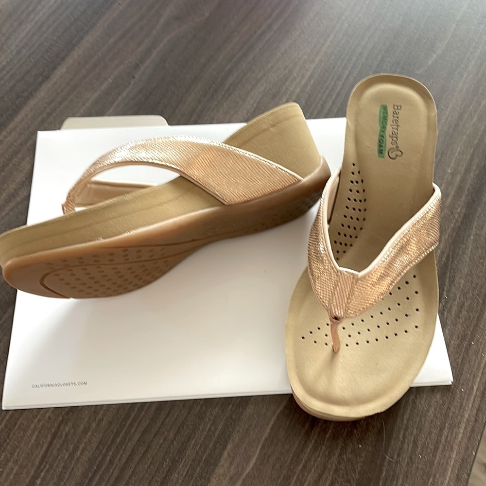 Gold wedge flip flop sandals by Baretraps. Women’s shoes - size 7 - like new
